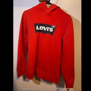 Red and black Levi’s hoodie.
